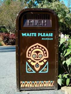 Disney trash cans are clearly marked with "Waste Please," encouraging guests to respond, "Yes, I do want to throw this trash away!"